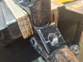 09 Drilled out & retapped hole.webp